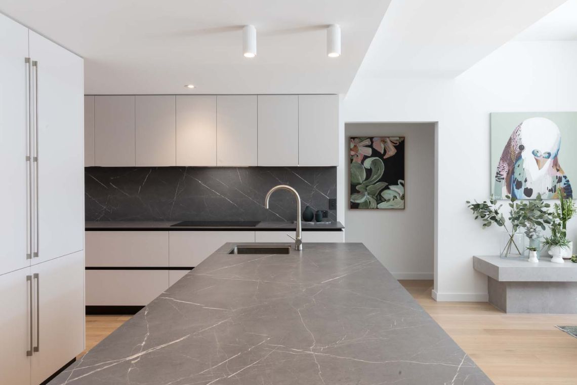 Kitchen with grey marble island and matching splashback in Floreat