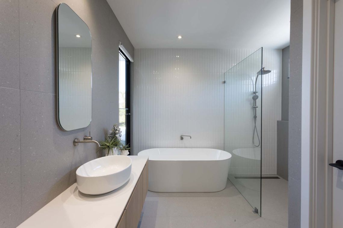 Bathroom with freestanding bath, walk in shower and vessel basin in Floreat