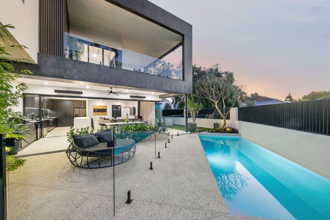 Lap pool beside an alfresco with daybed in Attadale