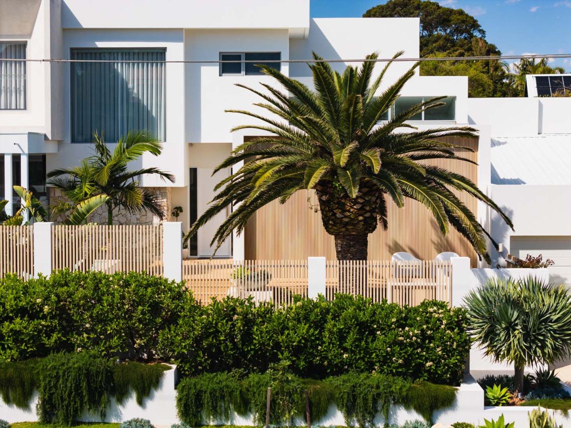 Front facade with palm tree and timber battens in City Beach